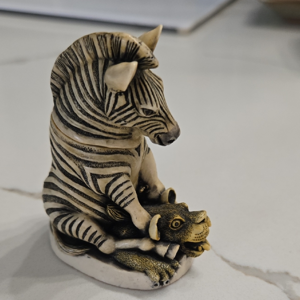Zebra and Lion Figurine - Black and Cream